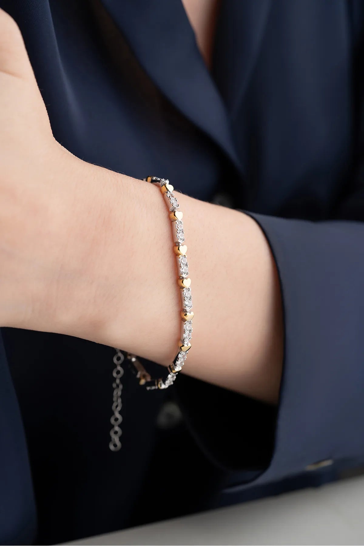 Zilveren Armband met Gouden Hartjes