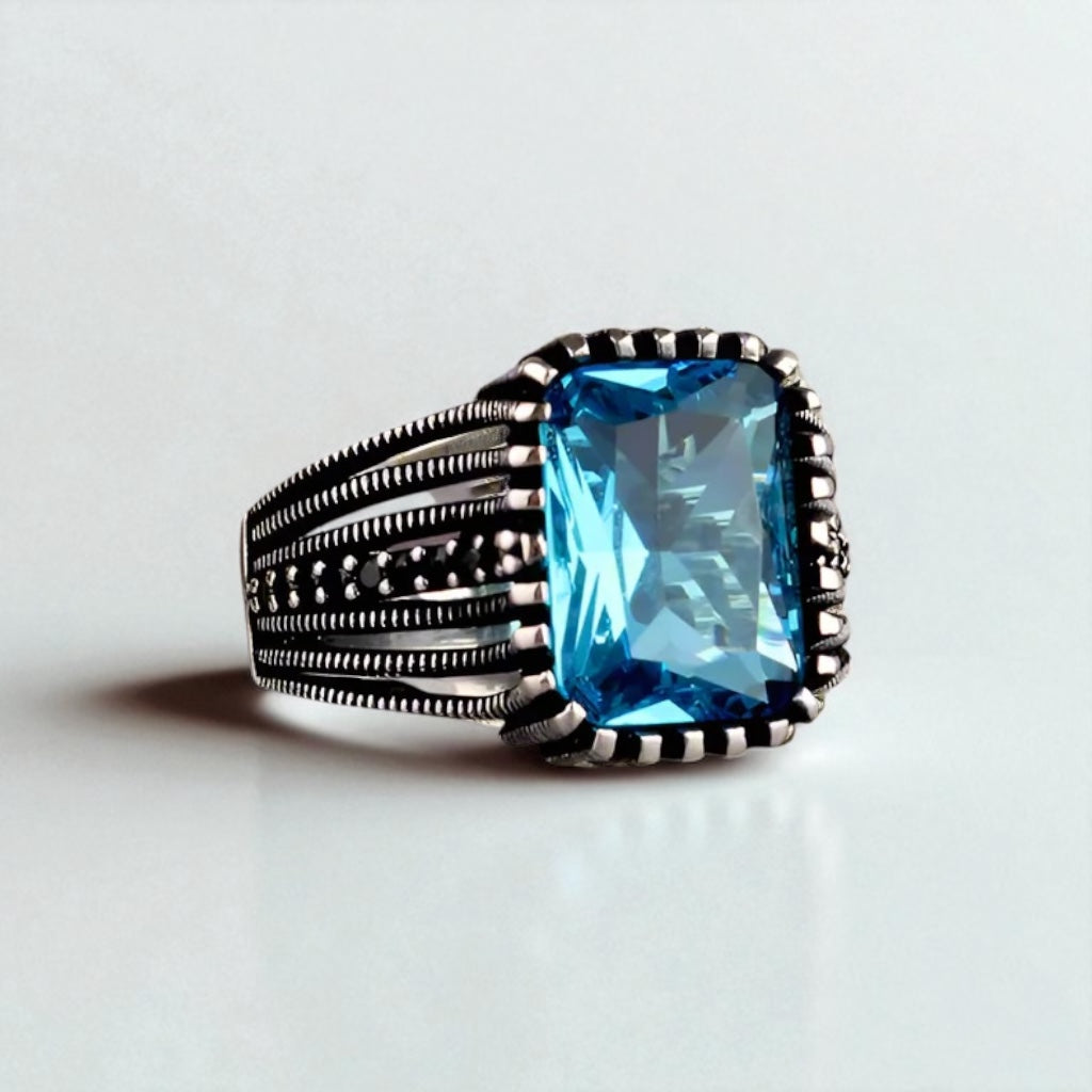 Silver men's ring with blue stone