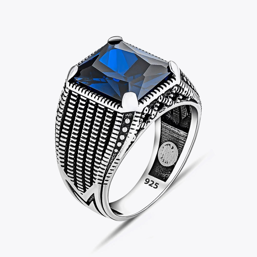 Silver men's ring with blue stone