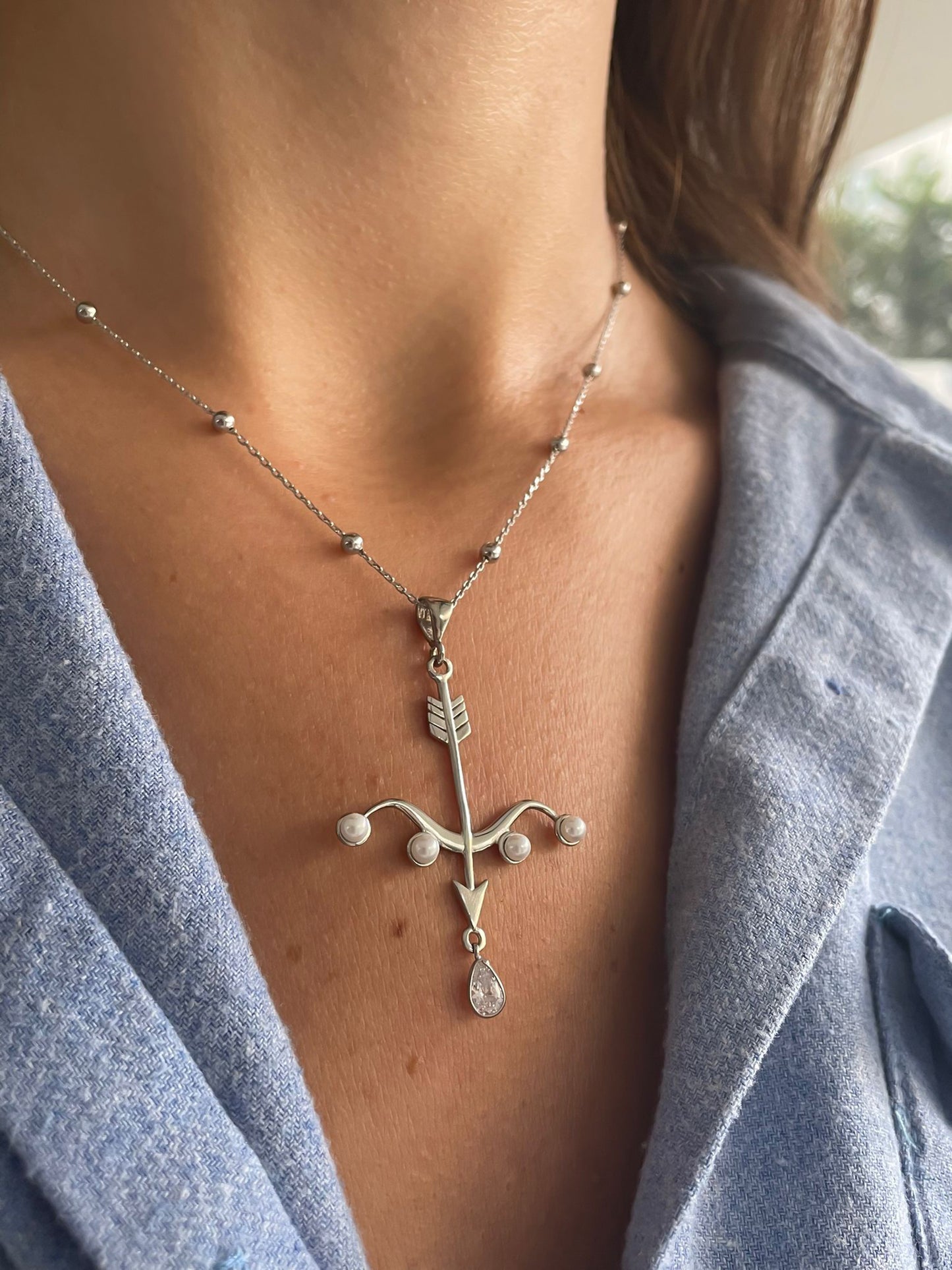 Chaîne en argent plus pendentif avec perles