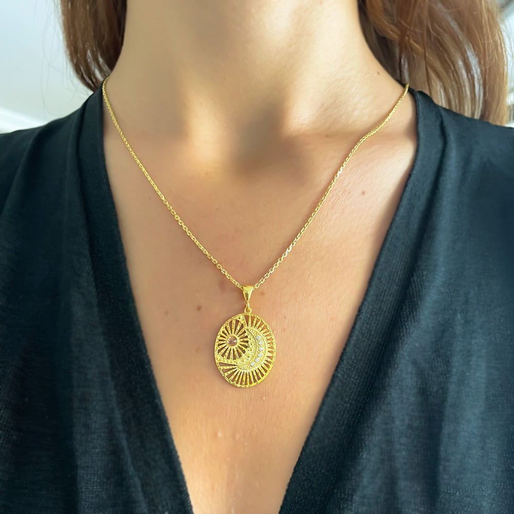 Collier en argent avec pendentif lune et soleil