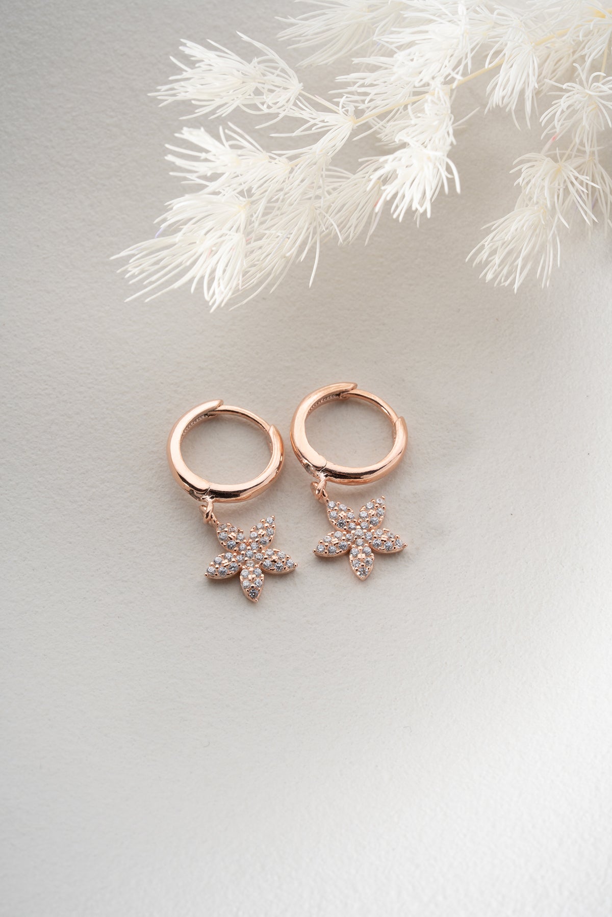 Rose Gold Colored Earrings with Flower Pendant