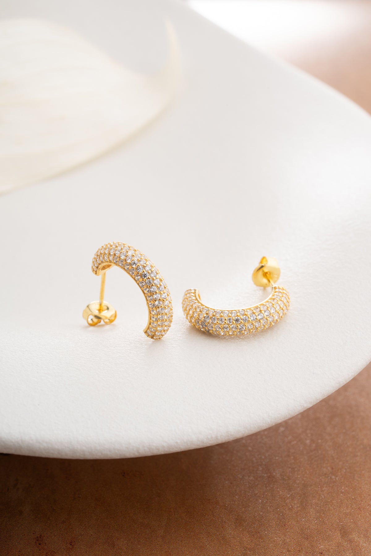 Sparkling half hoop earrings